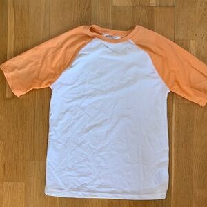 Orange and White Raglan rash guard. Size L.